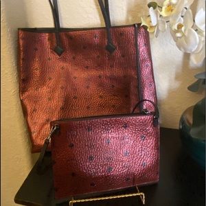 Red metallic MCM Tote and pouch.